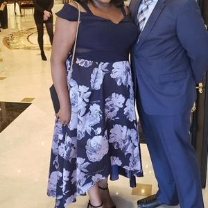 Xscape formal dress from Nordstrom. It is size 18W & mostly navy-ish blue.